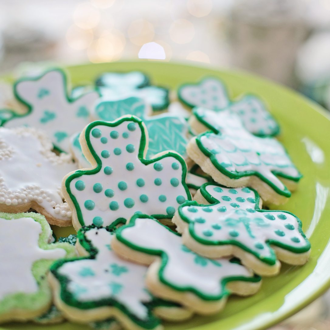 St Patrick's Day 2020 green-and-blue-clover-shaped-cookies-on-plate-3860490